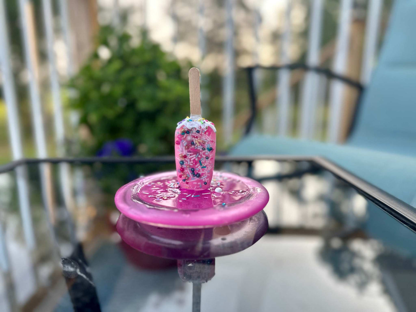 Popsicle Melting Pop Art Resin Sculpture Trinket Dish- Pretty in PinkA pink resin melting popsicle pop art sitting in a pink glass dish