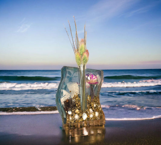 An ocean inspired Plant Vase created with Epoxy Resin and filled with real seashells. Home Decor and gift idea for Nature Lovers